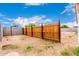 The backyard features a wooden fence at 3042 N 87Th Ave, Phoenix, AZ 85037