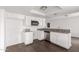 Bright kitchen featuring stainless steel appliances, granite counters, and light wood flooring at 3042 N 87Th Ave, Phoenix, AZ 85037