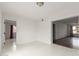 This living room features neutral paint and tile floor at 3042 N 87Th Ave, Phoenix, AZ 85037
