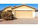 Home exterior featuring two car garage and neutral toned exterior at 306 W Angus Rd, San Tan Valley, AZ 85143