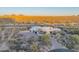 Stunning aerial shot of a modern desert home with a spacious three car garage at 30600 N Pima Rd # 19, Scottsdale, AZ 85266