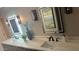 Modern bathroom with dual sinks, elegant lighting, and quartz countertop at 30600 N Pima Rd # 19, Scottsdale, AZ 85266