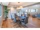 Contemporary dining room features modern lighting, seating for six, and abundant natural light at 30600 N Pima Rd # 19, Scottsdale, AZ 85266