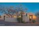 Beautifully landscaped home featuring mature trees and desert plants at 30600 N Pima Rd # 19, Scottsdale, AZ 85266