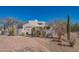 Inviting desert home with a desert landscape and a private entrance courtyard at 30600 N Pima Rd # 19, Scottsdale, AZ 85266