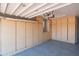 Organized garage with ample storage cabinets and epoxy flooring for a clean and functional space at 30600 N Pima Rd # 19, Scottsdale, AZ 85266