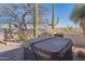 Relaxing hot tub area nestled amongst desert landscaping, offering a private outdoor retreat at 30600 N Pima Rd # 19, Scottsdale, AZ 85266