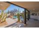 Inviting outdoor pool area featuring desert landscaping, stone accents and shaded patio at 30600 N Pima Rd # 19, Scottsdale, AZ 85266