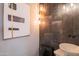 Stylish powder room featuring modern fixtures, vanity, and attractive lighting at 30600 N Pima Rd # 19, Scottsdale, AZ 85266