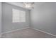 Neutral bedroom features carpet, window with blinds and a ceiling fan at 3650 W Denali Dr, Anthem, AZ 85086