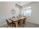 Bright dining area with plenty of natural light and stylish seating at 39237 N Acadia Way, Anthem, AZ 85086