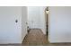 Hallway that features tile flooring and modern paint at 39237 N Acadia Way, Anthem, AZ 85086