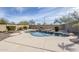 Beautiful backyard pool surrounded by desert landscaping and privacy walls at 39237 N Acadia Way, Anthem, AZ 85086