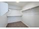 Bright walk-in closet with shelving and clothing racks for optimal storage at 39237 N Acadia Way, Anthem, AZ 85086