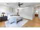 Cozy main bedroom featuring hardwood floors, neutral colors, and plenty of natural light at 3931 E Glenrosa Ave, Phoenix, AZ 85018