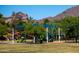 Vibrant community park with modern play structures surrounded by green space at 3931 E Glenrosa Ave, Phoenix, AZ 85018