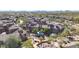 Elevated view showcasing residential buildings, lush landscaping, walking paths, and a fun playground in the community at 3935 E Rough Rider Rd # 1055, Phoenix, AZ 85050