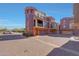 Elegant multi-story home showcasing unique architectural details and a well-maintained front exterior at 3935 E Rough Rider Rd # 1055, Phoenix, AZ 85050