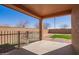 Relaxing outdoor back patio with open backyard area at 41375 W Barcelona Dr, Maricopa, AZ 85138