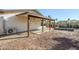 View of the backyard featuring a covered patio and open space at 4501 E Osage Ct, Phoenix, AZ 85044