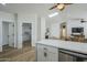 Hallway with a view into the living room and the kitchen at 4501 E Osage Ct, Phoenix, AZ 85044