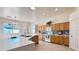 Kitchen with ample wood cabinets, quartz counters and modern appliances at 4541 N 129Th Dr, Litchfield Park, AZ 85340