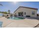 Inviting pool with a unique rock feature is ready for your relaxation and enjoyment at 4541 N 129Th Dr, Litchfield Park, AZ 85340