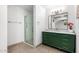 Bright bathroom featuring a sleek vanity with marble countertop and a glass-enclosed shower at 4550 W Bloomfield Rd, Glendale, AZ 85304