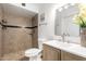 Charming bathroom featuring tiled walls, updated fixtures, and a shower with black accent tiles at 4550 W Bloomfield Rd, Glendale, AZ 85304