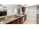 Kitchen featuring granite countertops, stainless steel appliances, and wood cabinetry at 4550 W Bloomfield Rd, Glendale, AZ 85304