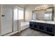 Modern bathroom features a double sink vanity, soaking tub, and separate shower at 4658 S Rufino Ln, Gold Canyon, AZ 85118