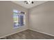 Standard bedroom with wood floors, neutral walls, and window with a view at 4658 S Rufino Ln, Gold Canyon, AZ 85118