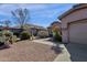 Charming single-story home with low maintenance desert landscaping, neutral palette and a private two-car garage at 4658 S Rufino Ln, Gold Canyon, AZ 85118