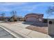 Charming single-story home with low maintenance desert landscaping and a private two-car garage at 4658 S Rufino Ln, Gold Canyon, AZ 85118