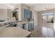 Kitchen sink with updated cabinets, stainless steel appliances and a mosaic tile backsplash at 4658 S Rufino Ln, Gold Canyon, AZ 85118