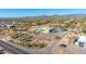 An aerial view of a modern home featuring a pool and desert landscaping at 5468 E Dove Valley Rd, Cave Creek, AZ 85331