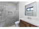 Modern bathroom featuring tiled shower with glass doors, vanity and toilet at 5468 E Dove Valley Rd, Cave Creek, AZ 85331