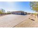 Long paved driveway leads up to a spacious three-car garage at 5468 E Dove Valley Rd, Cave Creek, AZ 85331