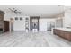 Bright and airy living room with fireplace, ceiling fan, and tile floors at 5468 E Dove Valley Rd, Cave Creek, AZ 85331