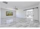 Large bedroom with modern barn door leading to bright ensuite bathroom at 5468 E Dove Valley Rd, Cave Creek, AZ 85331