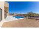 Backyard with a modern pool, desert landscaping, and unobstructed views at 5468 E Dove Valley Rd, Cave Creek, AZ 85331