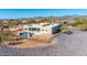 Aerial shot showcasing a modern home with a refreshing pool at 5468 E Dove Valley Rd, Cave Creek, AZ 85331