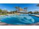 Tranquil community pool with clear blue water, perfect for swimming and unwinding in a serene setting at 5624 S Winchester --, Mesa, AZ 85212