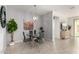 Cozy dining area featuring a glass table, modern chairs, and stylish decor at 5624 S Winchester --, Mesa, AZ 85212