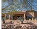 Backyard view featuring desert plants and mountain views with outdoor living space at 5705 S Pinnacle Ln, Gold Canyon, AZ 85118