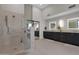 Modern bathroom with frameless glass shower, dual sinks, and elegant fixtures at 5914 E Dale Ln, Cave Creek, AZ 85331