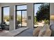 Bedroom view features well-manicured backyard with large windows at 5914 E Dale Ln, Cave Creek, AZ 85331