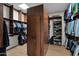 Large walk-in closet with custom shelving and storage solutions at 5914 E Dale Ln, Cave Creek, AZ 85331