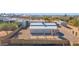 Aerial view of a barn, rock lot and metal fence at 5914 E Dale Ln, Cave Creek, AZ 85331