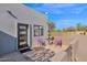 Charming outdoor patio with a modern privacy wall, perfect for relaxing and entertaining under the sky at 5914 E Dale Ln, Cave Creek, AZ 85331